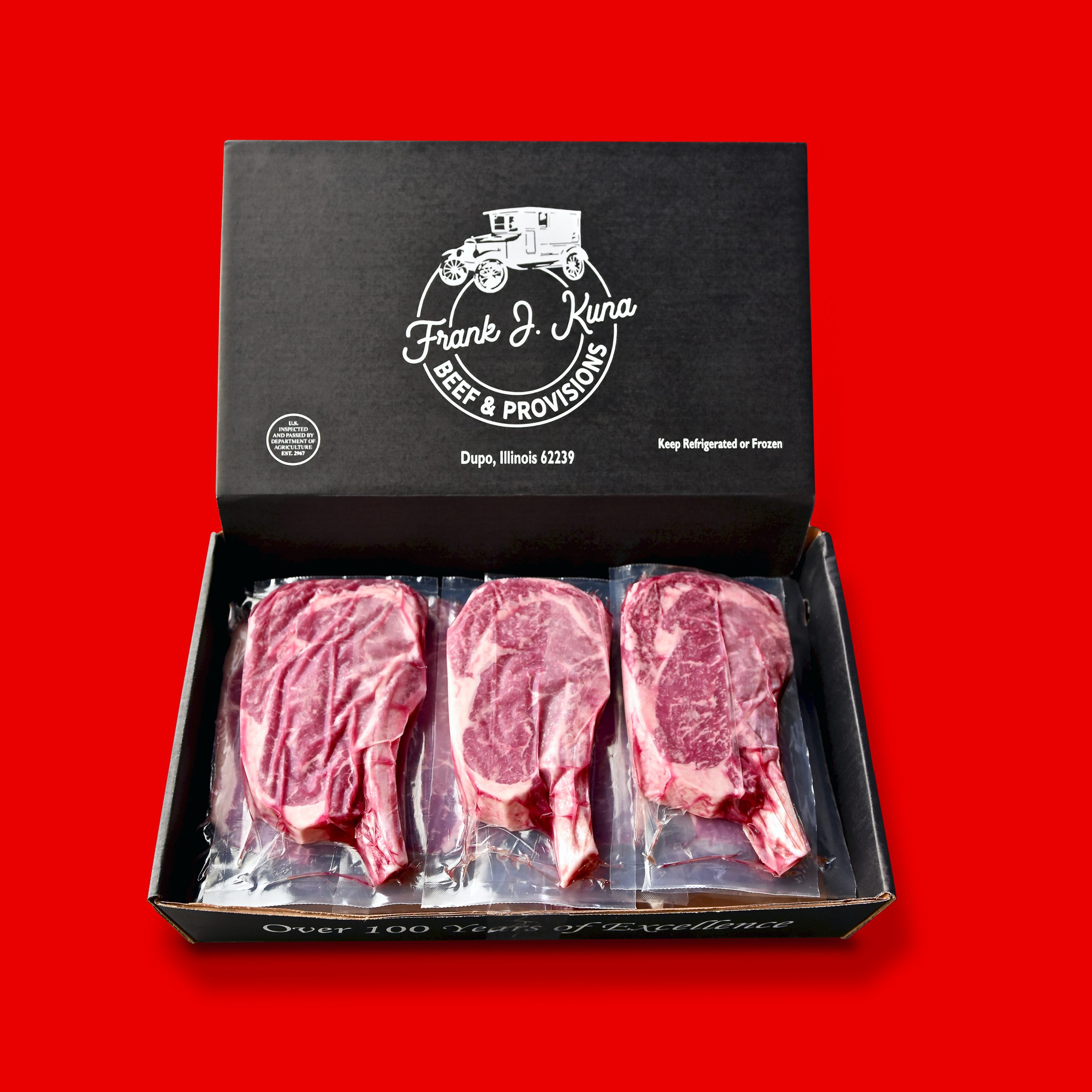 Frank J Kuna packaged steaks over red background